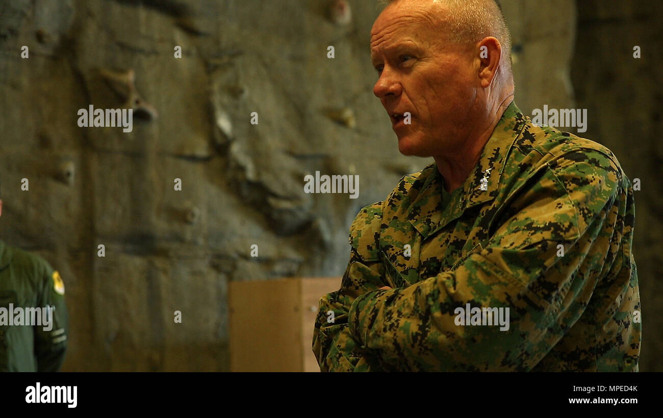 U.S. Marine Corps Lt. Gen. Lawrence D. Nicholson, the commanding general of III Marine Expeditionary Force, thanks U.S. Airmen with the 31st and 33rd Rescue Squadron who assisted in the search and rescue of an MV-22 Osprey in December 2016 at Kadena Air Force Base Okinawa, Japan, Feb. 14, 2017. The aircraft had five crew members onboard, but thanks to the quick thinking of the pilot and the efforts of the airmen who responded to the incident, all were recovered. (U.S. Marine Corps photo by Sgt. Laura Gauna) Stock Photo