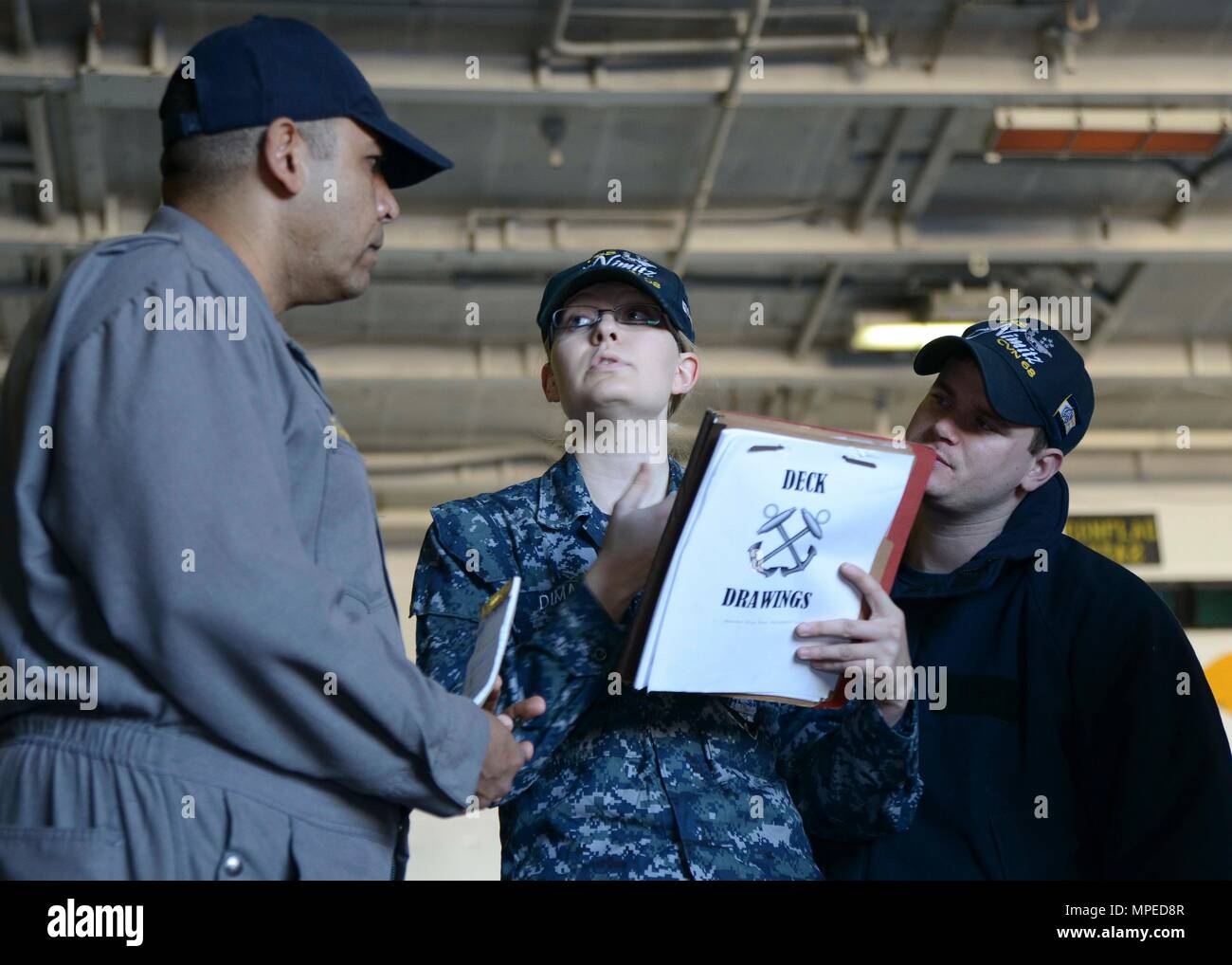 SAN DIEGO (Feb. 13, 2017) - Lt. Richard Barr, a member of the Board of Inspection and Survey (INSURV) team, speaks with Sailors during a demonstration on board the aircraft carrier USS Nimitz (CVN 68). Nimitz is currently undergoing INSURV in preparation for an upcoming 2017 deployment. (U.S. Navy photo by Mass Communication Specialist 3rd Class Samuel Bacon/Released) Stock Photo
