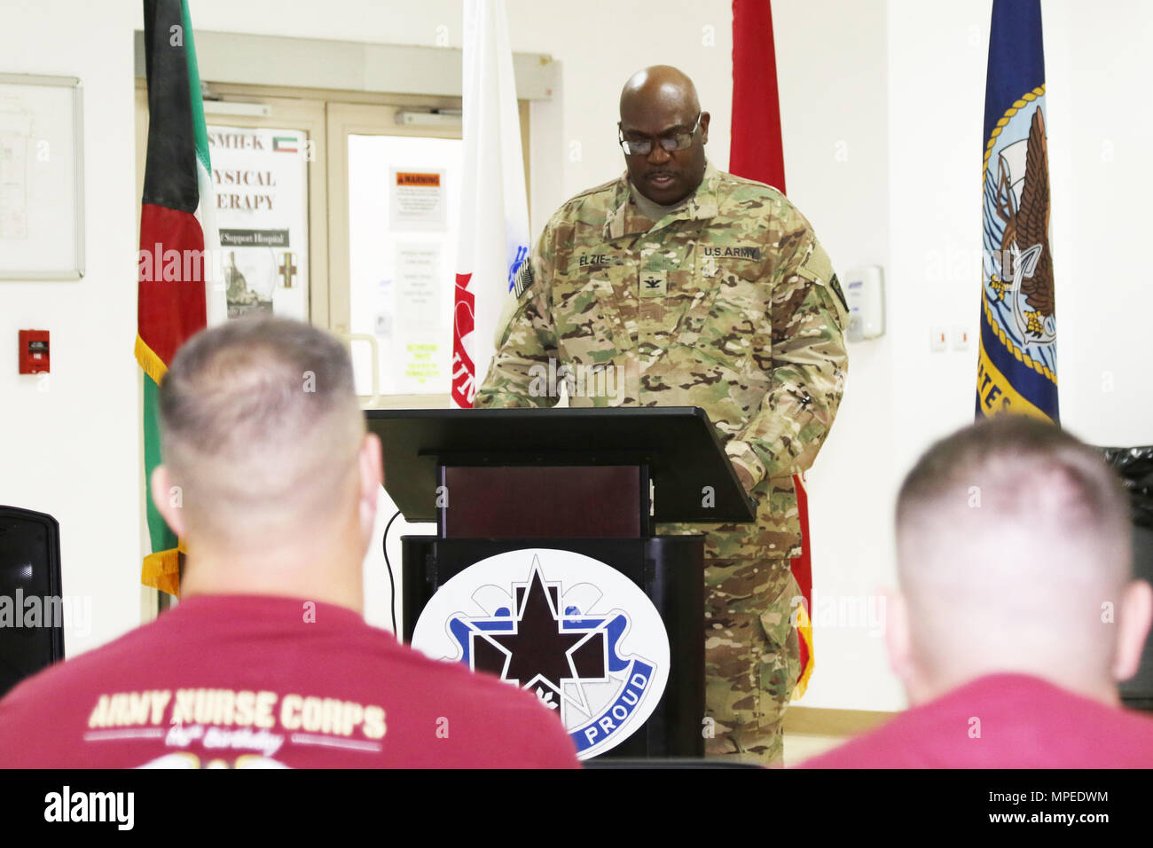 CAMP ARIFJAN, Kuwait--Col. John N. Elzie, chief nurse, 3rd Medical Deployment and Sustainment Command, speaks to Soldiers of the 31st Combat Support Hospital during the 116th birthday celebration of the Army Nurse Corps, Camp Arifjan, Kuwait, Feb. 2, 2017. (U.S. Army photo by Sgt. Tom Wade, USARCENT PAO) Stock Photo
