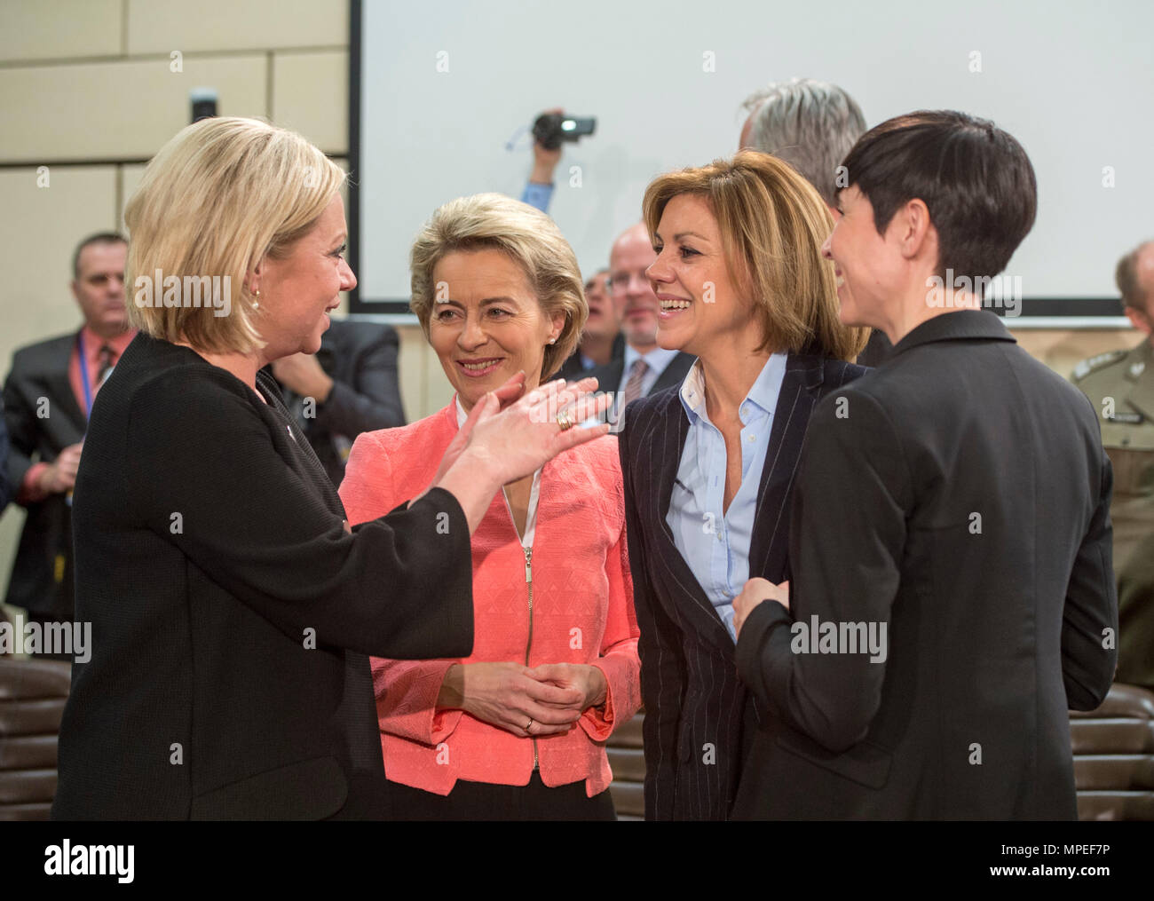 Female ministers of defense talk before a meeting of the North Atlantic Council the NATO Headquarters in Brussels, Belgium, Feb. 15, 2017. From left to right are Jeanine Hennis-Plasschaert (Netherlands), Ursula von der Leyen (Germany), Maria Dolores de Cospedal Garcia (Spain) and Ine Marie Eriksen Soreide. (DOD photo by U.S. Air Force Tech. Sgt. Brigitte N. Brantley) Stock Photo