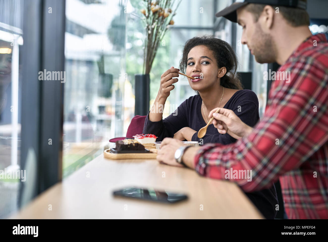 Dating of interracial couple Stock Photo