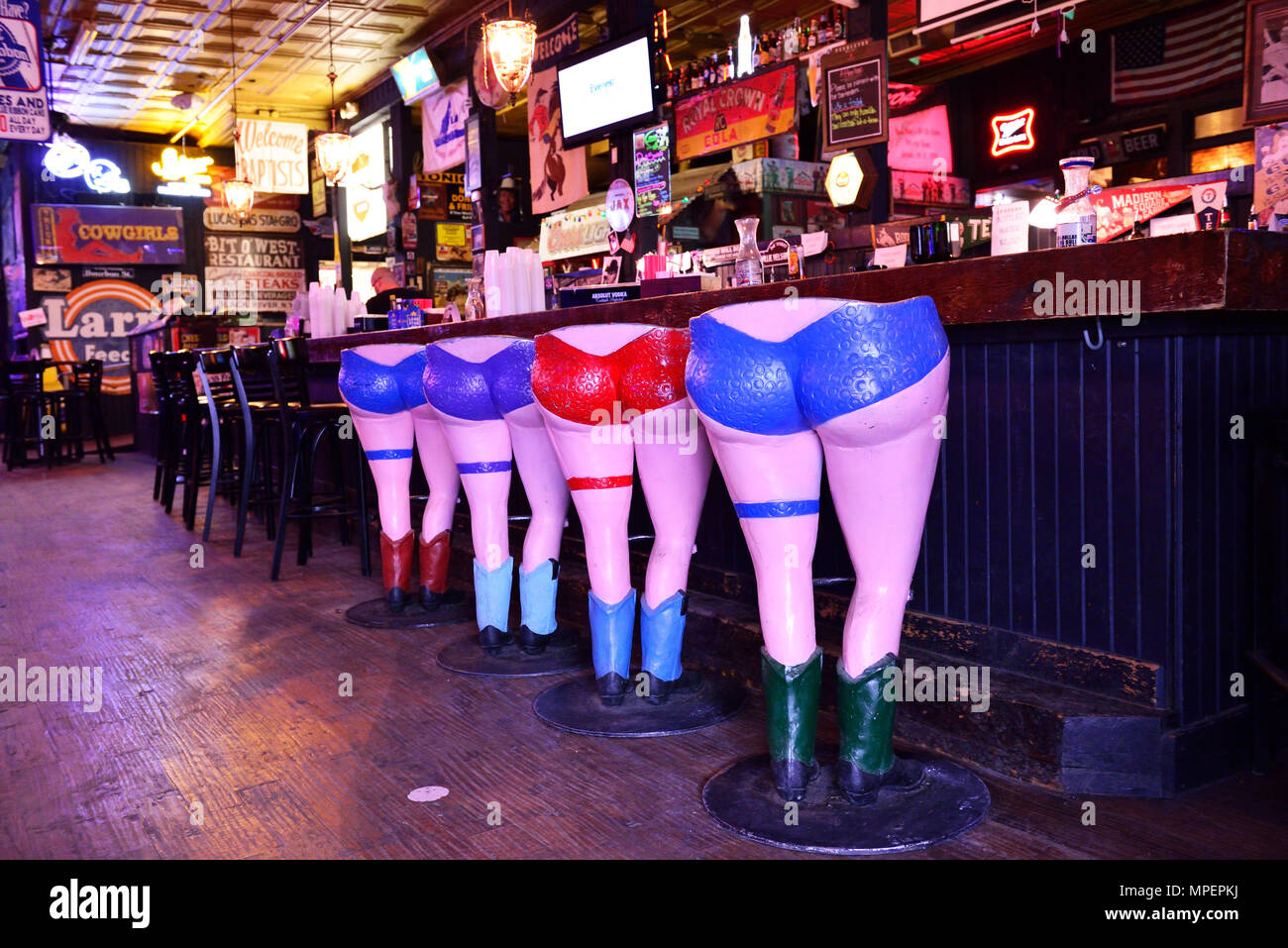 Barstool in the form of a can-can dancer in the Longhorn Saloon, Stockyards National Historic District, Fort Worth, Texas, USA Stock Photo