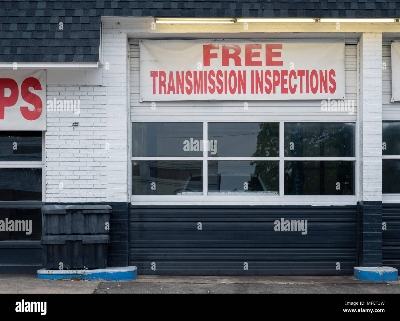 Auto repair shop bays shade tree mechanic deals transmission inspection