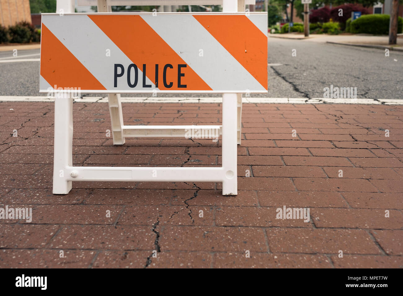 Police warning hazard sign controlled access to a restricted area Stock Photo
