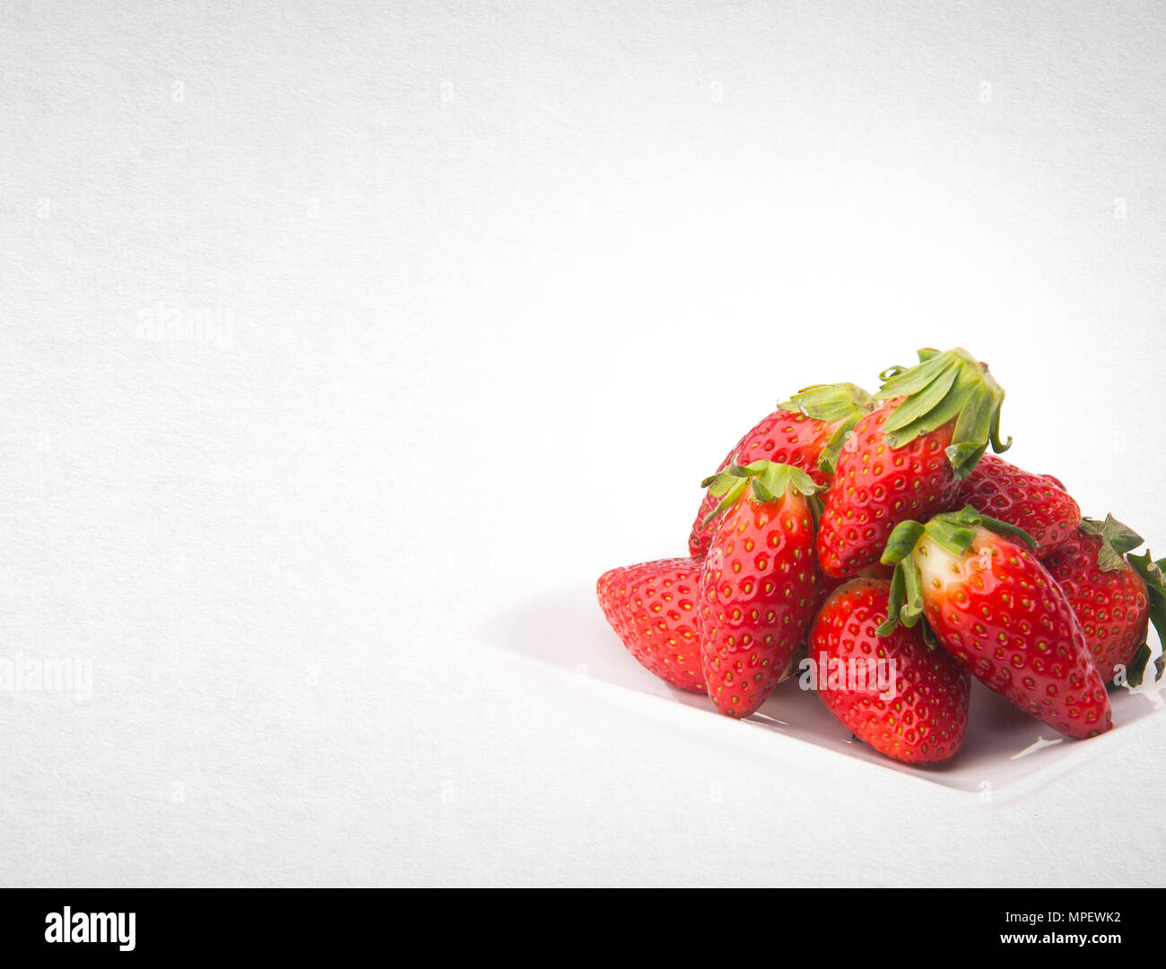 strawberry or fresh red strawberry on a background Stock Photo - Alamy