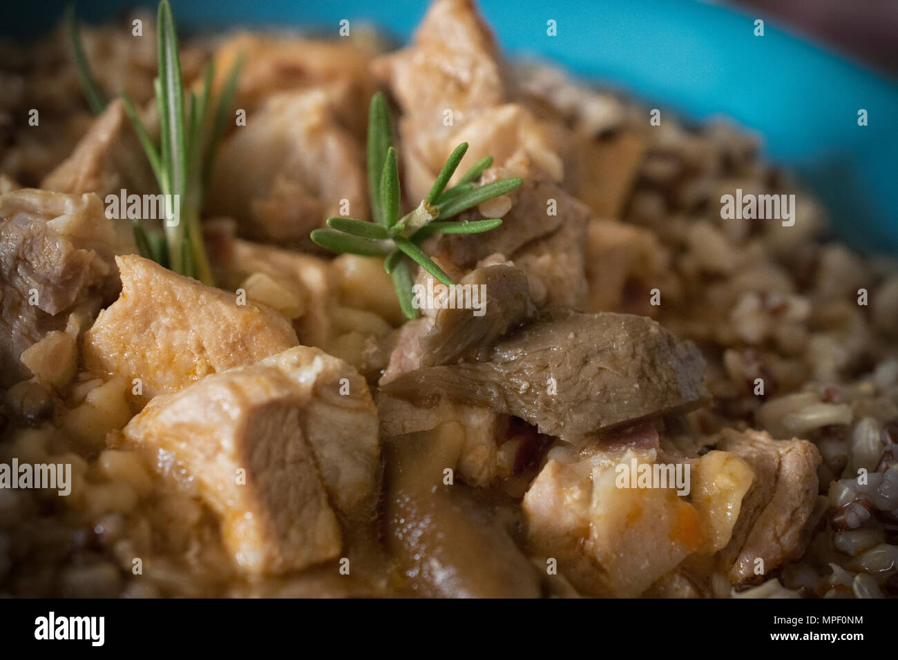 Pork Stew and Brown Rice Stock Photo Alamy