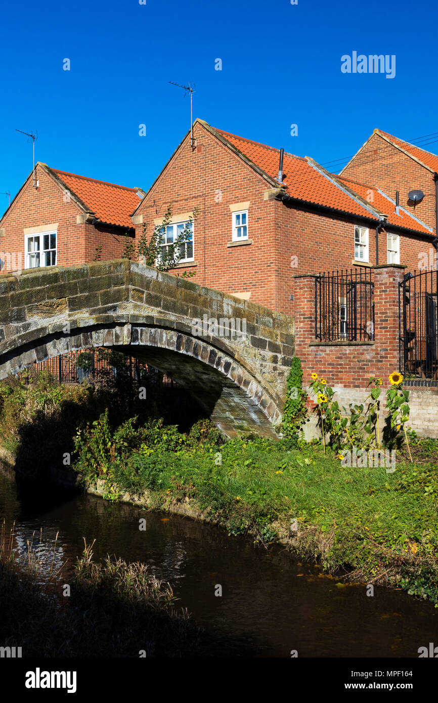 Ancient pack horse bridge on River Leven at Stokesley, North Yorkshire