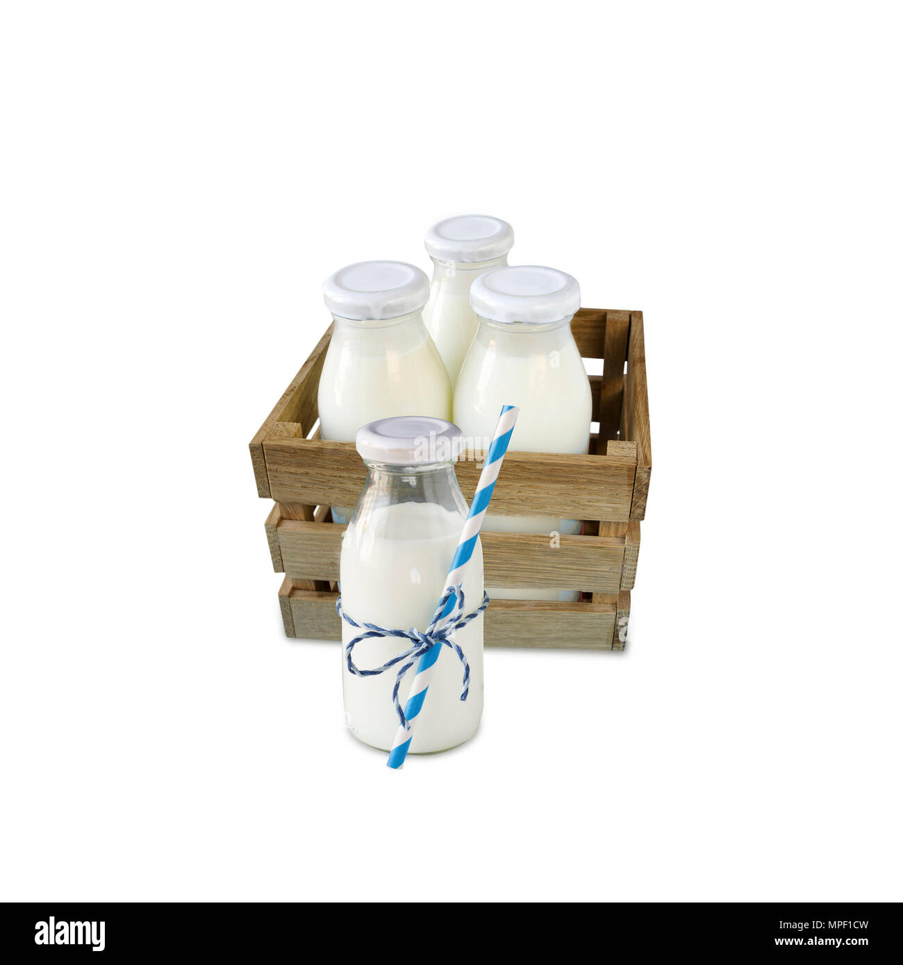 milk bottles in a box isolated on white background Stock Photo