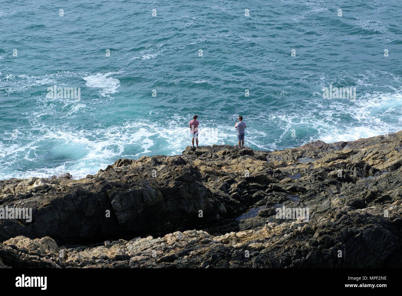 Two men fishing in Australia, Coffs Harbour. Men with fishing rods