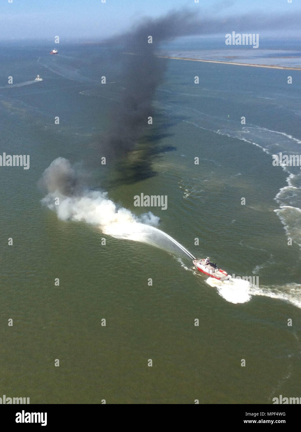 Two Port of Houston Fire Boats extinguish an engulfed 44foot sport