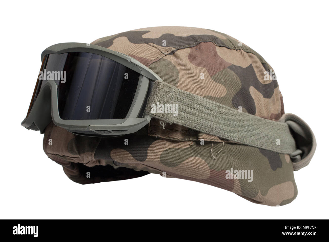 kevlar helmet with camouflage cover and protective goggles Stock Photo -  Alamy