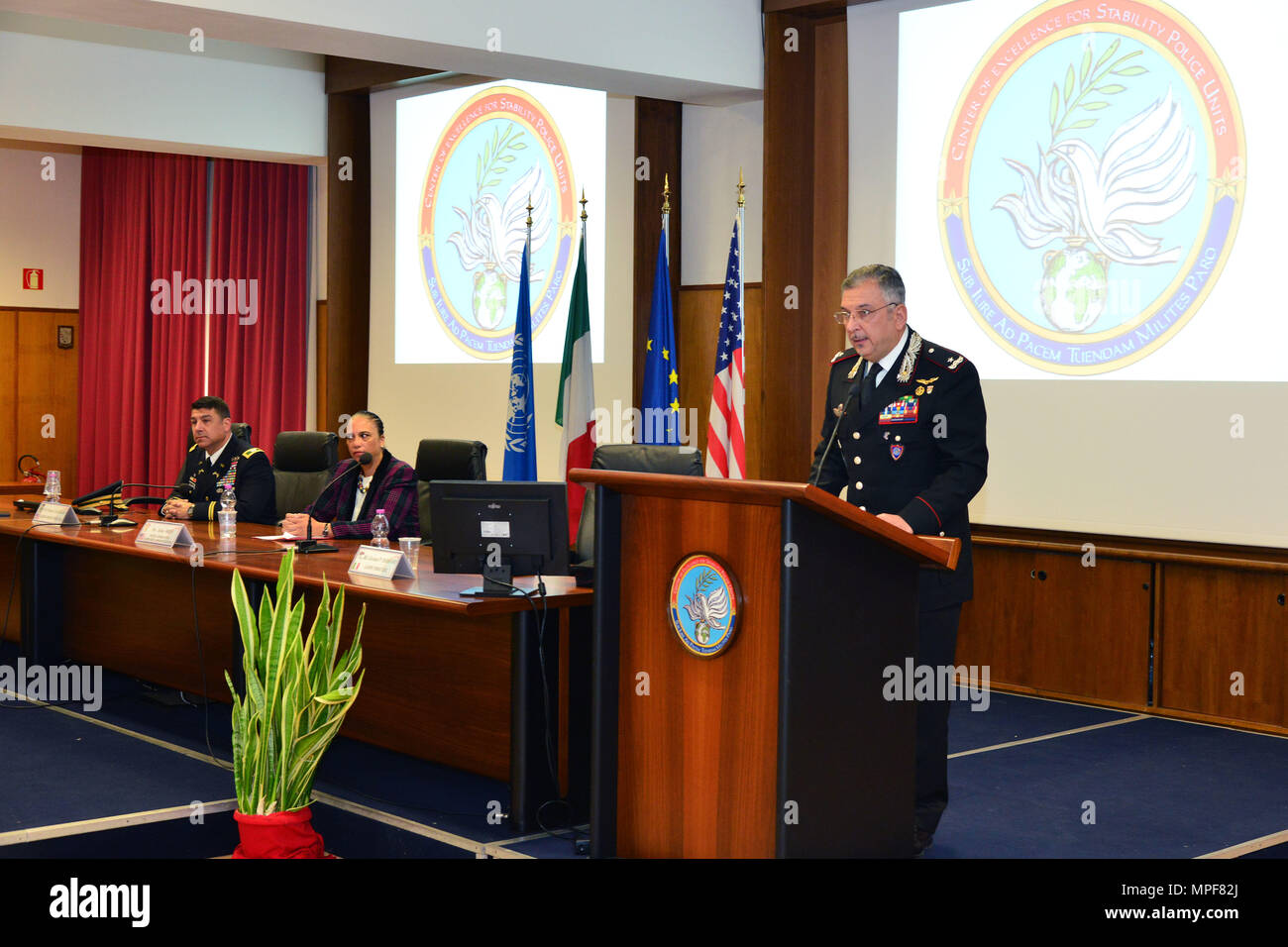 Commanding General, Brig. Gen. Giovanni Pietro Barbano (right), Center of Excellence for Stability Police Units (CoESPU) director, addresses dignitaries and guests from Europe, Africa, Italy and the U.S. during the graduation ceremony of the 14th Protection of Civilians Course at the CoESPU in Vicenza, Italy, Feb. 21, 2017. (U.S. Army Photo by Visual Information Specialist Paolo Bovo/released) Stock Photo