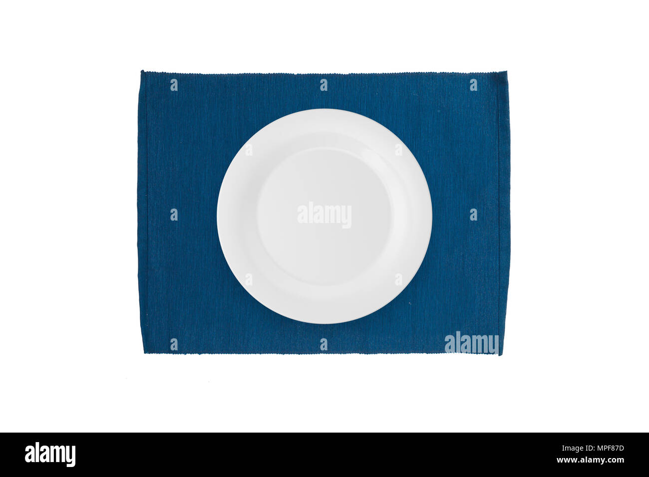 Top view of empty white plate on mat, isolated on white background ...