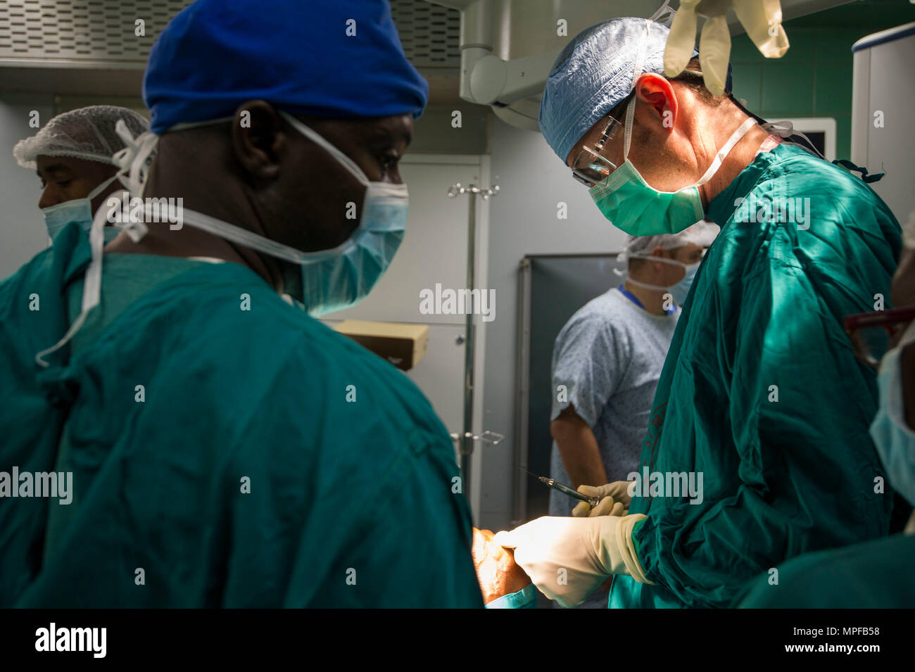 U.S. Army Lt. Col. David Tucker, an oral and maxillofacial surgeon