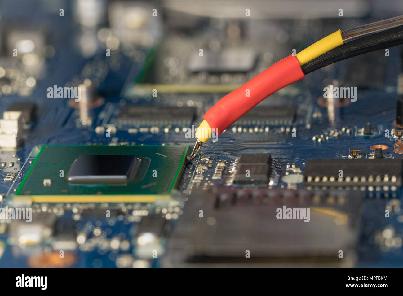 BGA chip soldering on the soldering station. Removal of temperature from  the chip thermocouple. Close-up photo Stock Photo - Alamy