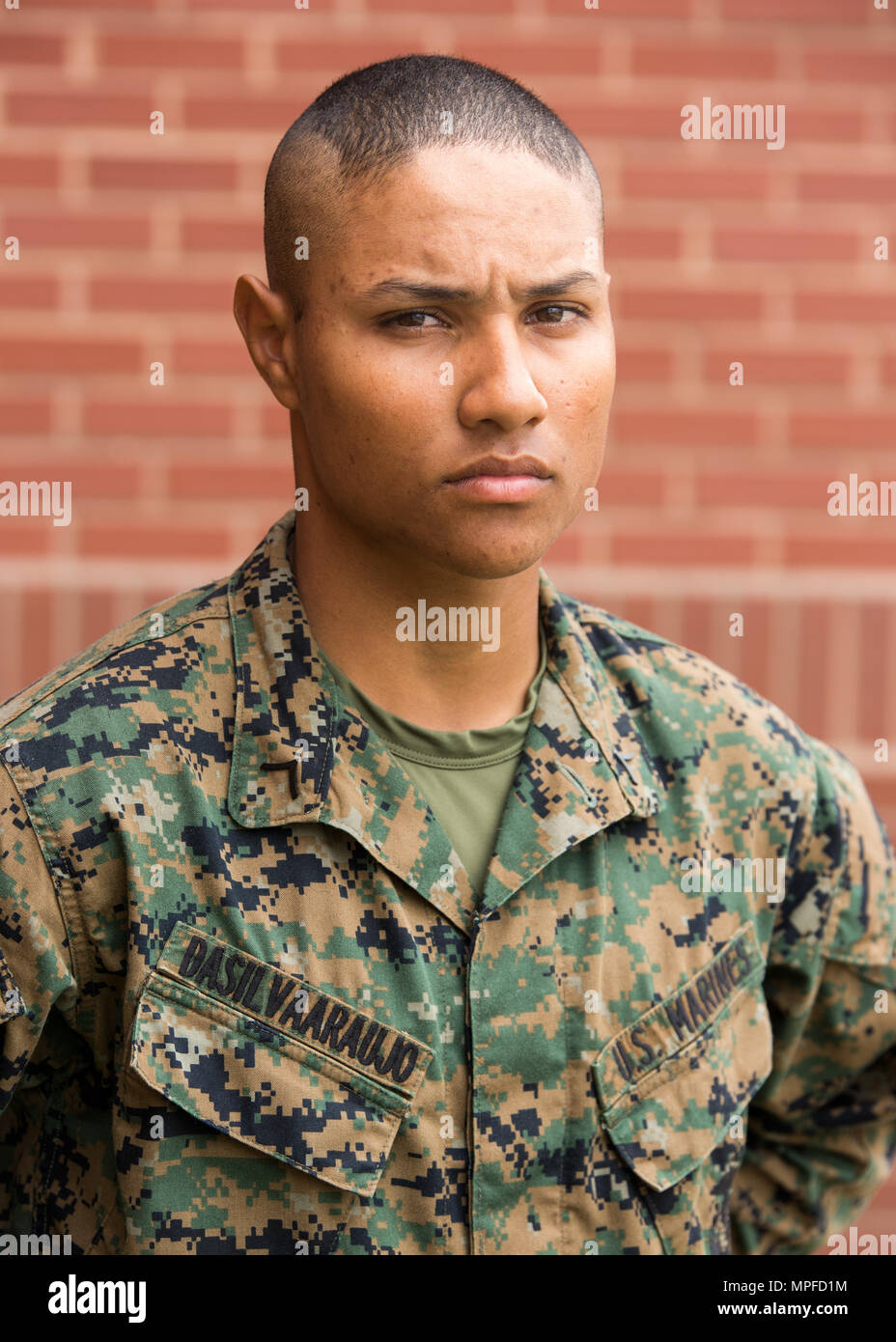 Pfc. Lucas F. Dasilva Araujo, Platoon 3013, Lima Company, 3rd Recruit Training Battalion, earned U.S. citizenship Feb. 23, 2017, on Parris Island, S.C. Before earning citizenship, applicants must demonstrate knowledge of the English language and American government, show good moral character and take the Oath of Allegiance to the U.S. Constitution. Dasilva Araujo, from Queens, N.Y., originally from Brazil, is scheduled to graduate Feb. 24, 2017. (Photo by Lance Cpl. Maximiliano Bavastro) Stock Photo