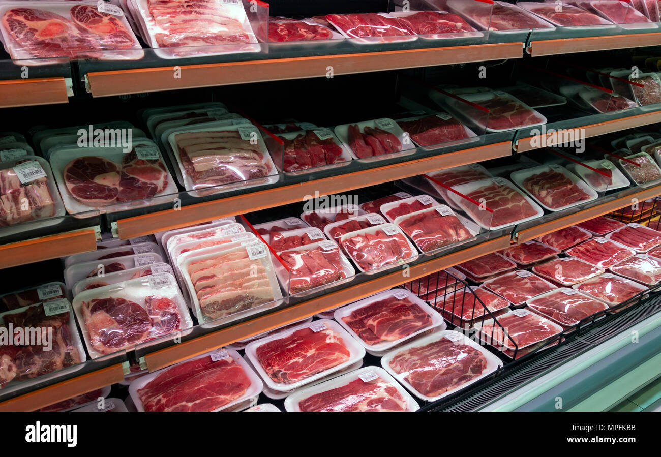 Prepared meat counter at La Comer supermarket in San Miguel de Allende, Mexico Stock Photo