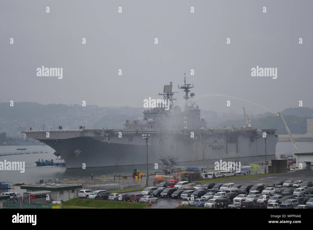 SASEBO, Japan (April 10, 2017) The amphibious assault ship USS Bonhomme Richard (LHD 6) returns to Sasebo, Japan, after a patrol in the Indo-Asia-Pacific region. Bonhomme Richard embarked the 31st Marine Expeditionary Unit (31st MEU) to enhance U.S. Navy and U.S. Marine Corps integration and to work with allies and partners in the region. Stock Photo