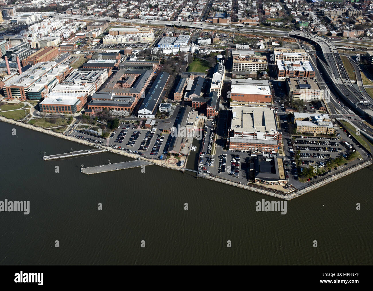 170302-N-AG722-014  WASHINGTON (March 2, 2017) An aerial view of Naval Support Activity (NSA) Washington on the historic Washington Navy Yard (WNY). The Navy base is the “Quarterdeck of the Navy” and serves as the Headquarters for Naval District Washington, where it houses numerous support activities for the fleet and aviation communities. (U.S. Navy photo by Mass Communication Specialist 1st Class John Belanger/Released) Stock Photo