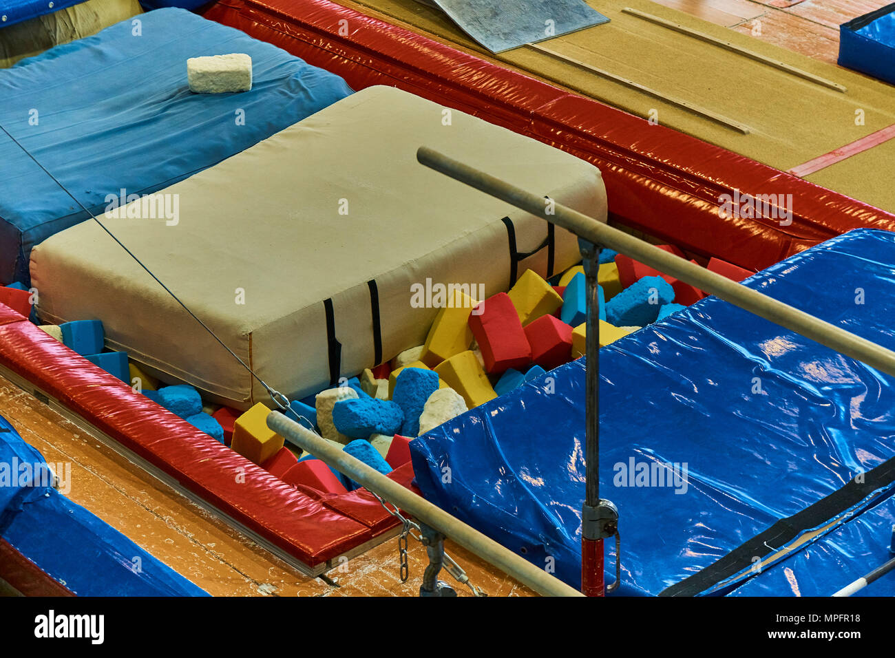 Gymnastic bars and mats in gymnastic center Stock Photo Alamy