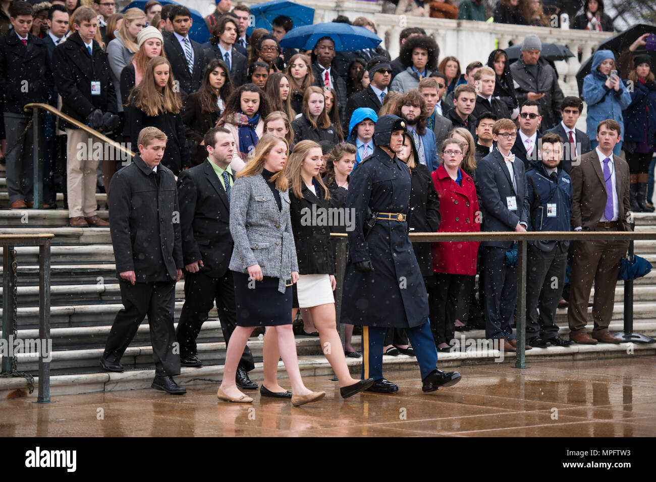 From the left, Andrew Pogue, from Missouri; Dakota Fleury, from Washington, D.C.; Marion Lovett, from New Hampshire; and Amanda Finnegan, from South Dakota; represent the high school students participating in the United States Senate Youth Program during a wreath laying ceremony at the Tomb of the Unknown Soldier in Arlington National Cemetery, March 10, 2017, in Arlington, Va. The students also toured the Memorial Amphitheater Display Room. (U.S. Army photo by Rachel Larue/Arlington National Cemetery/released) Stock Photo