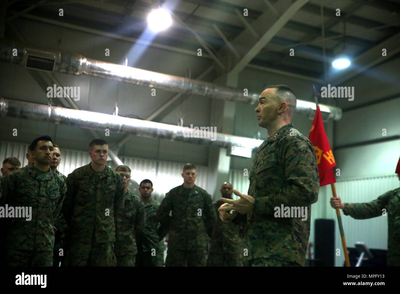Maj. Gen. John K. Love speaks to Marines with Black Sea Rotational Force 17.1 during his visit to Mihail Kogalniceanu Air Base, Romania, March 9, 2017. The visit allowed Love to speak with forward deployed Marines and answer question concerning the mission of BSRF 17.1. Love is the commanding general of 2nd Marine Division. (U.S. Marine Corps photo by Cpl. Sean J. Berry) Stock Photo