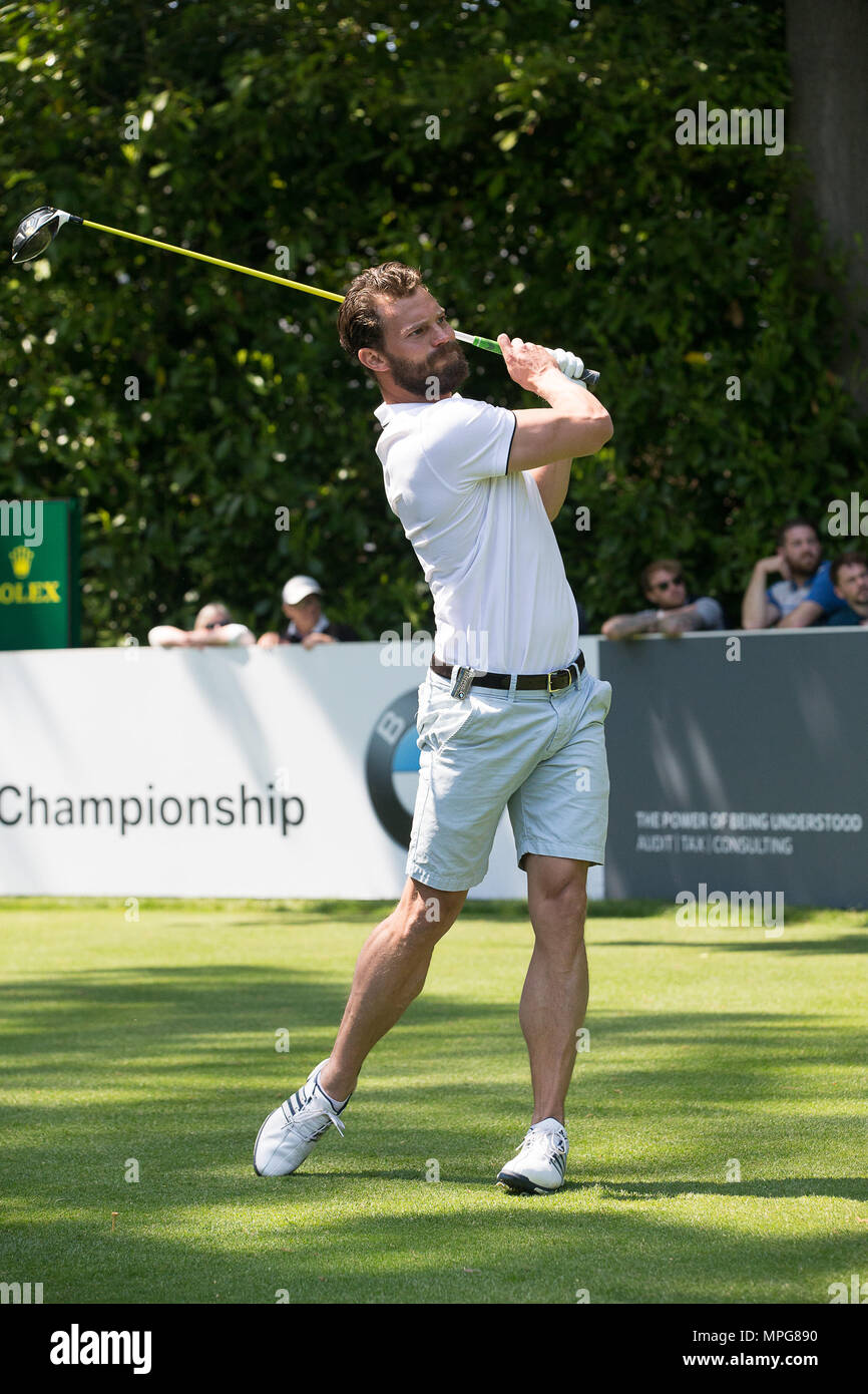 Wentworth, UK. 23rd May 2018. ' Mr Grey will Play you now' Fifty shades of grey star Jamie Dornan practicing his swing at the PGA Pro Am at Wentworth. Together with fellow actors Matthew Goode (the Crown and Downton Abbey) and Dougray Scott (The Woman in White) The three actors are taking part in the annual Pro Am on the West Course at Wentworth. Others playing include Niall Horan(One Direction) Piers Morgan and Pep Guardiola Credit: David Betteridge/Alamy Live News Stock Photo