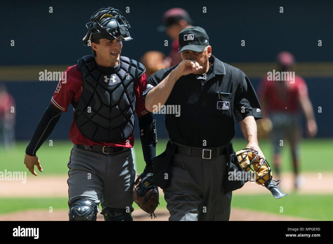Milwaukee, WI, USA. 23rd May, 2018. Arizona Diamondbacks catcher John Ryan Murphy #36 talks with home plate umpire after a mound visit during the Major League Baseball game between the Milwaukee Brewers and the Arizona Diamondbacks at Miller Park in Milwaukee, WI. John Fisher/CSM/Alamy Live News Stock Photo