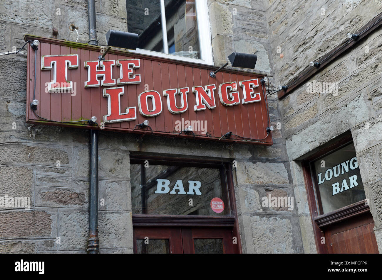 Signage for The Lounge Bar in Shetland famous for its local music sessions that take place on an evening Stock Photo
