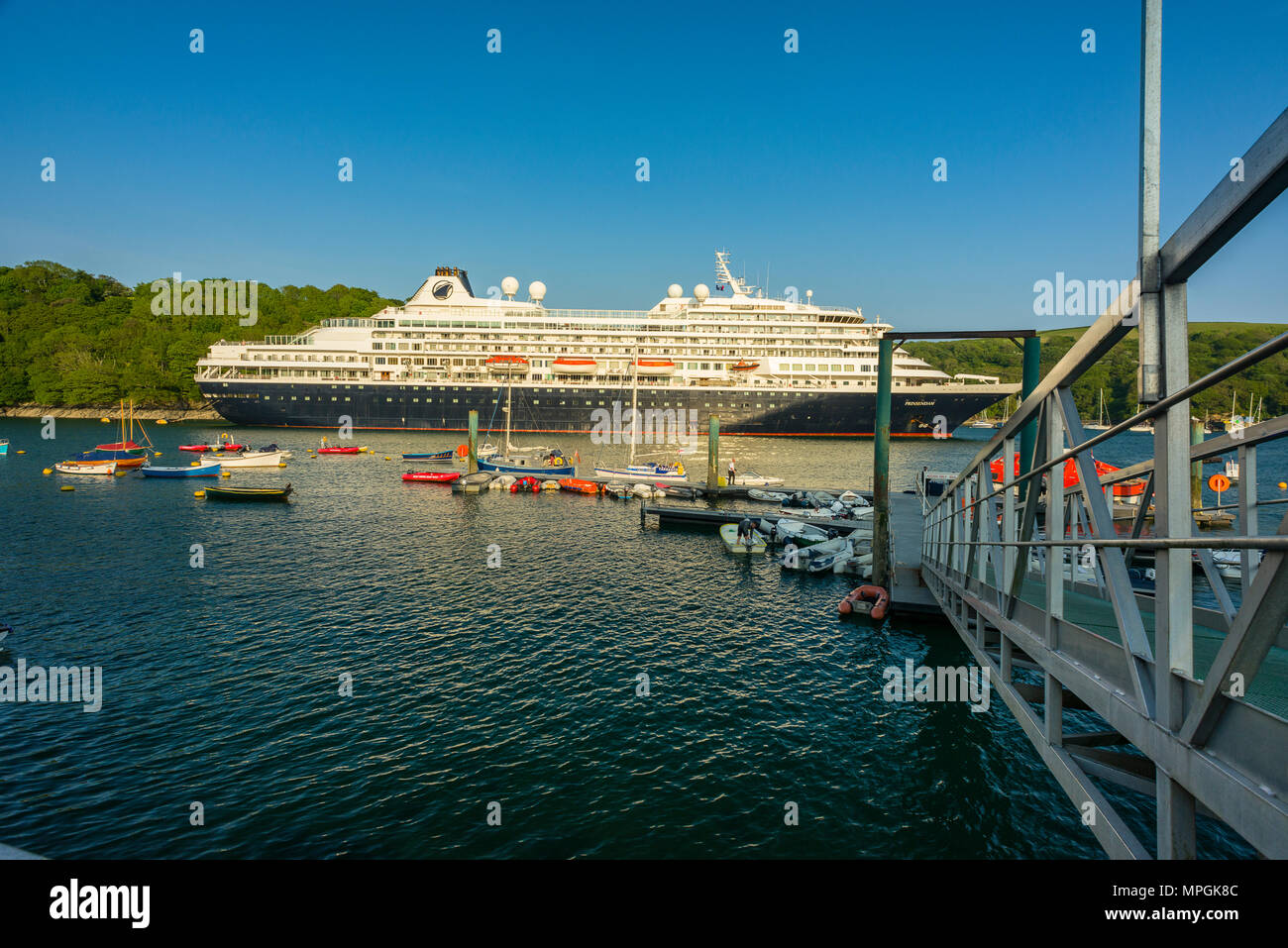 The Prinsendam, a Dutch cruise line company anchors in Fowey, Cornwall for a day trip before heading off to the Scilly Isles as it journeys around the Stock Photo