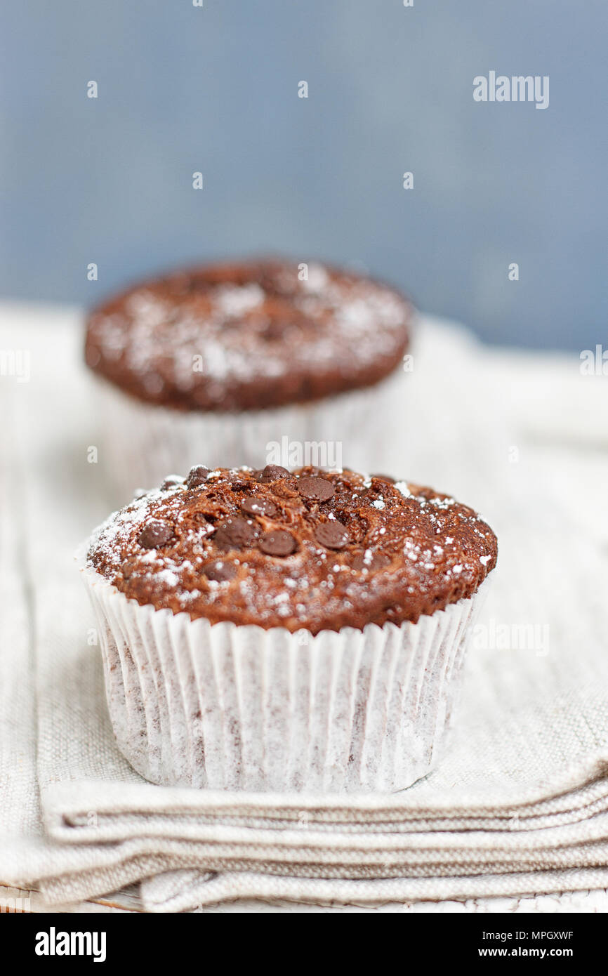 Two chocolate muffin on a fabric napkin Stock Photo
