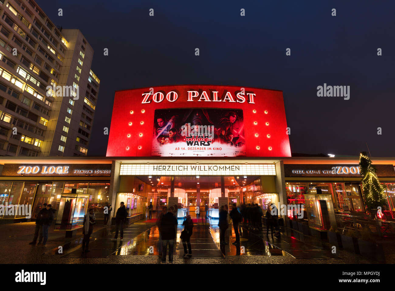 Historic 'Zoo Palast' cinema in Berlin at night. Built in the late 50s, it had hosted the Berlin International Film Festival (Berlinale) for decades. Stock Photo