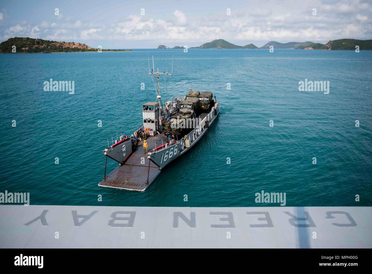 170224-N-JH293-017 SATTAHIP, Thailand (Feb. 24, 2017) Landing craft utility 1666, assigned to Naval Beach Unit 7, prepares to embark the well deck of the amphibious transport dock ship USS Green Bay (LPD 20) during Exercise Cobra Gold 2017. Cobra Gold is the largest Theater Security Cooperation exercise in the Indo-Asia-Pacific region and is an integral part of the U.S. commitment to strengthen engagement in the region. (U.S. Navy photo by Mass Communication Specialist 1st Class Chris Williamson/Released) Stock Photo