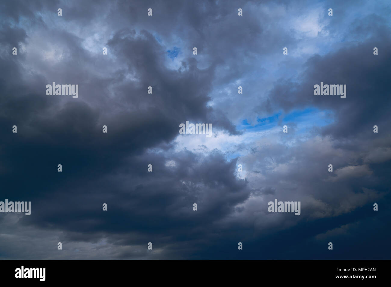 Dramatic clouds of stormy sky in a stormy weather day Stock Photo