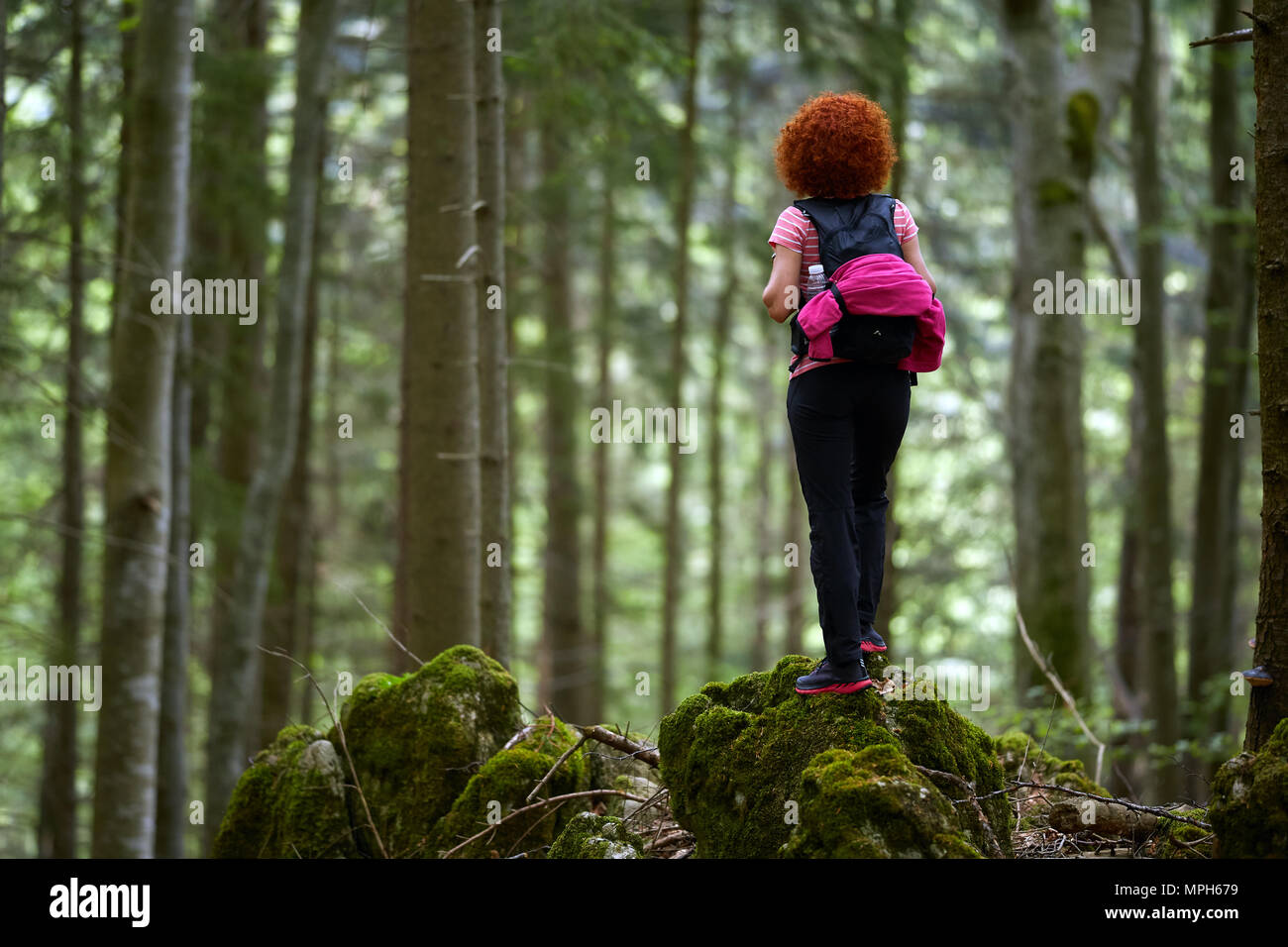 Curly redhead woman hiking hi-res stock photography and images - Alamy