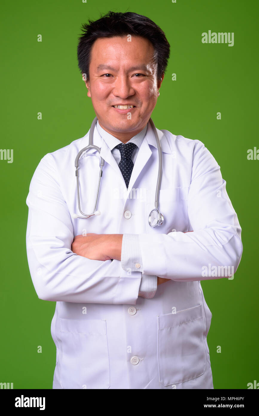 Happy mature japanese man doctor hi-res stock photography and images ...