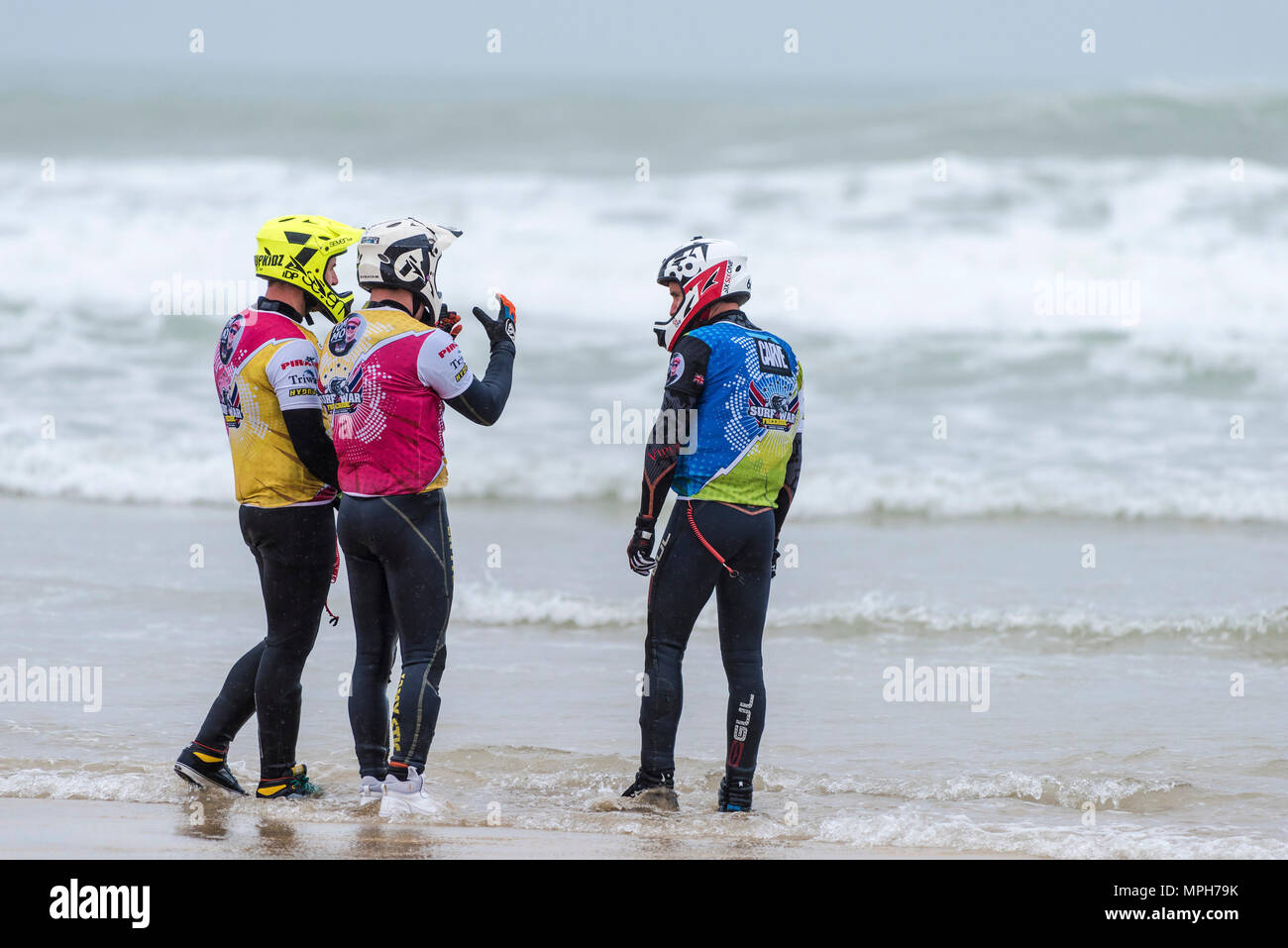 The Freeride World Jetski Championship at Fistral Beach in Newquay, Cornwall.  Competitors discussing tactics. Stock Photo