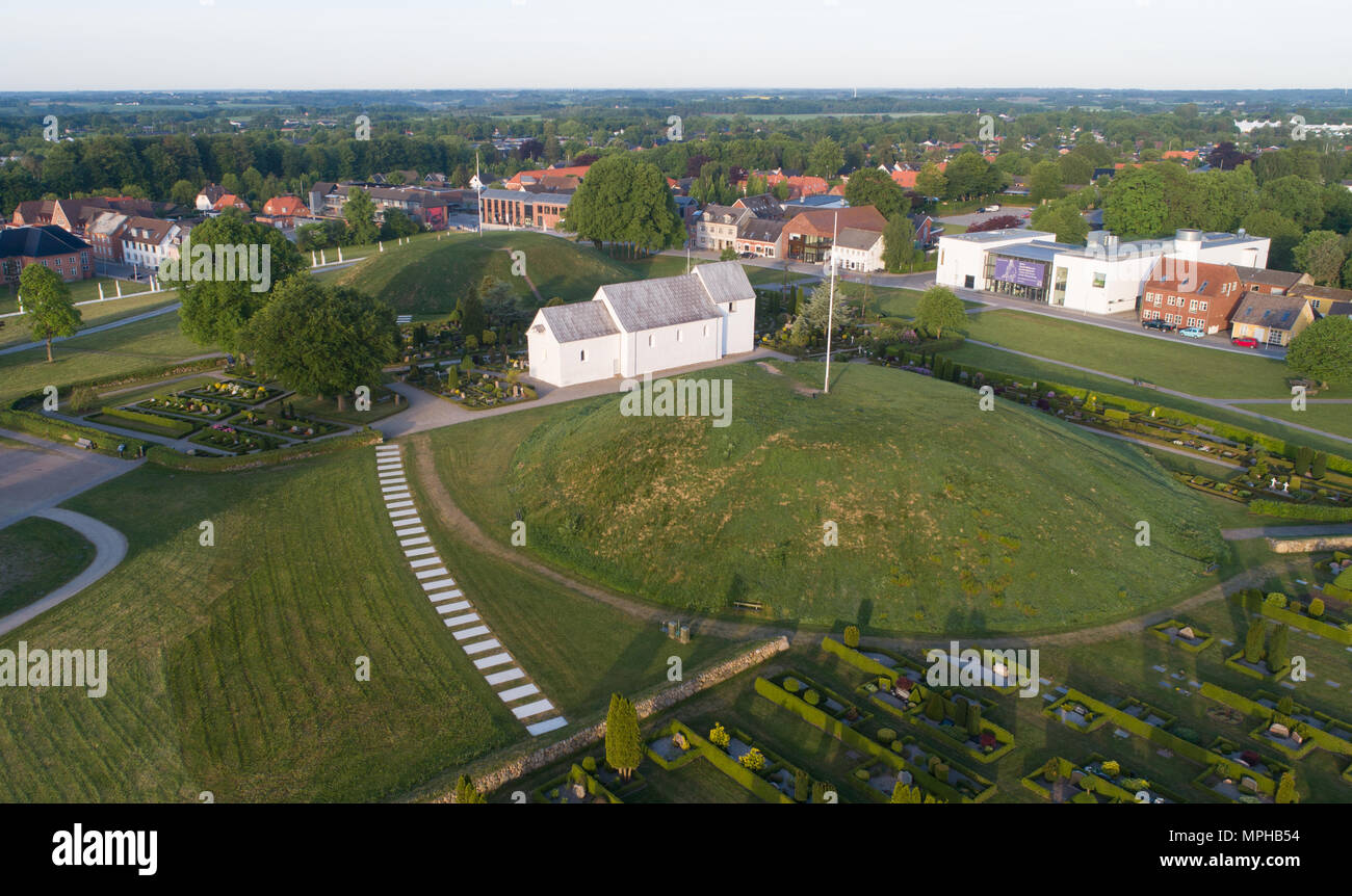 Unesco World Heritage Site at Jelling in Denmark with the burial mounds where the first king and queen of Denmark was buried in the 10th century. Stock Photo