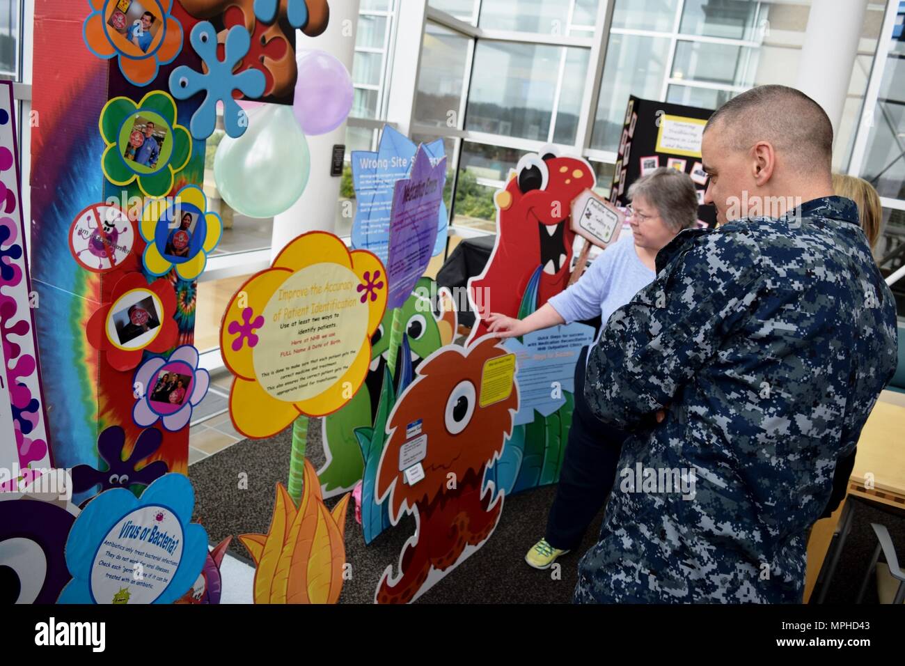 Naval Hospital Bremerton recognizes National Patient Safety Week  by reminding and educating staff, beneficiaries and visitors to 'Weed out  Germs,' with a colorful display specifically designed to catch everyone's  attention so they can in turn prevent infection (Official Navy photo by  Douglas H Stutz, Naval Hospital Bremerton Public Affairs). Stock Photo