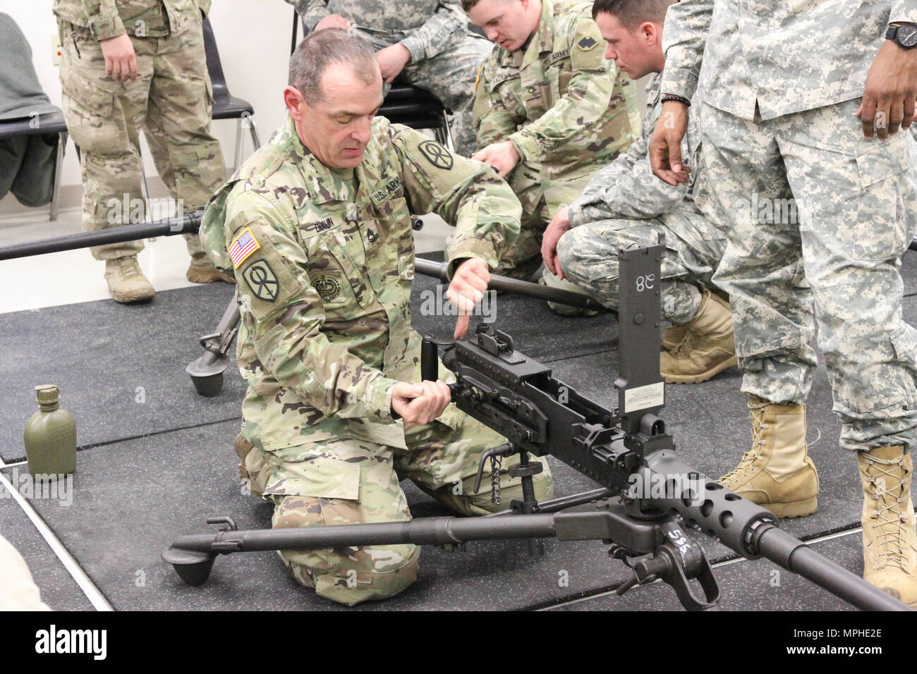 A U.S. Army Reserve Soldier performs a functions check on an M2 .50 ...