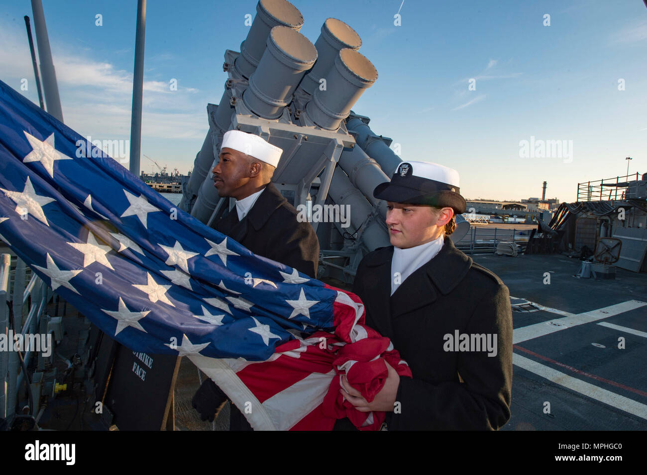 N Ws581 016 Norfolk Va March 13 17 Quartermaster Seaman Brandon Garland Smith From New York City Left And Operations Specialist Seaman Hannah Harris From Greeley Col Stand By To Raise The Color On The Aft