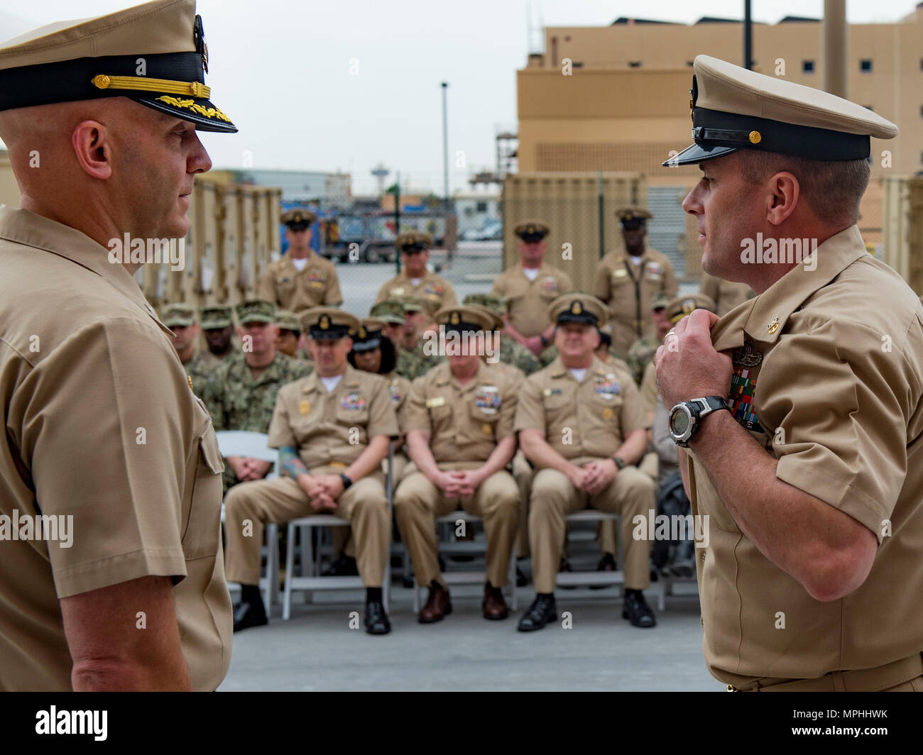 Task Force 56 The Commander of Task Force 56 removes the silver Master Explosive ...