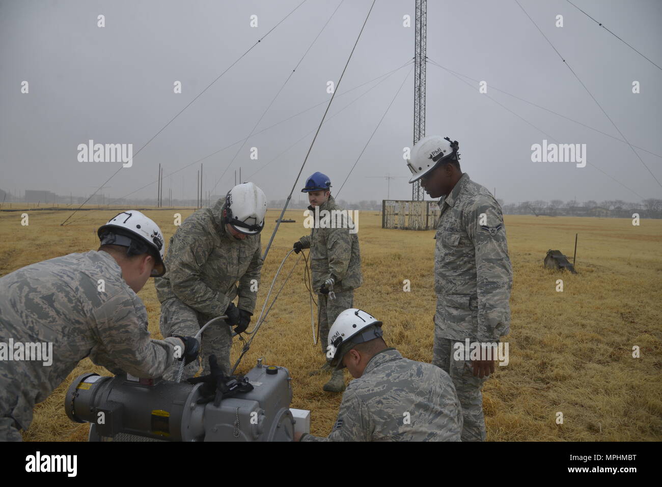 Members of the 374th Communication Squadron Cable and Antenna System