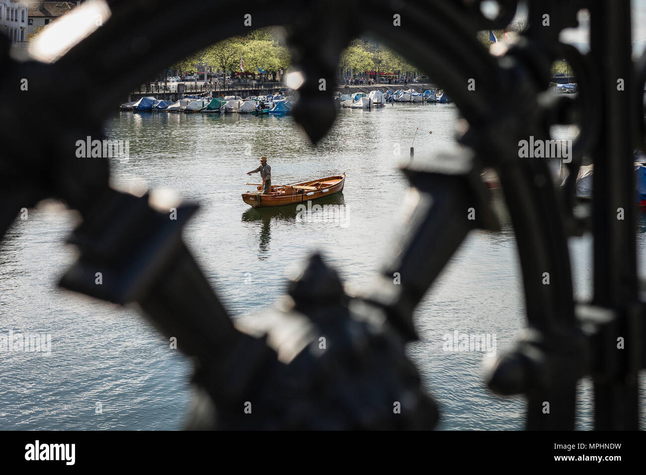Fisherman on the Limmat river, Zürich, Switzerland Stock Photo