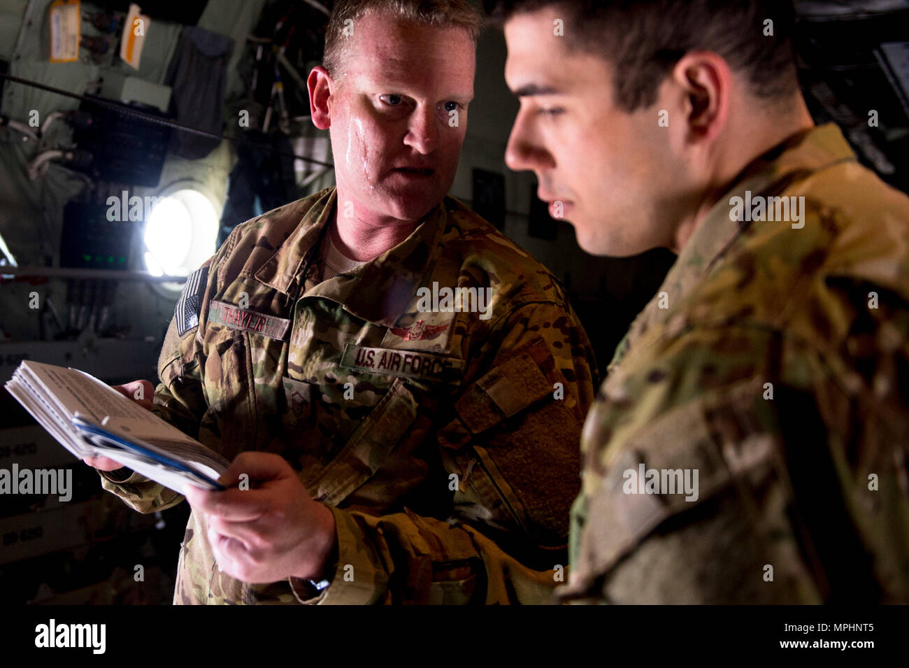 Master Sgt.Joseph Thayer and Staff Sgt. Robert LeMay both loadmasters assigned to the 9th
