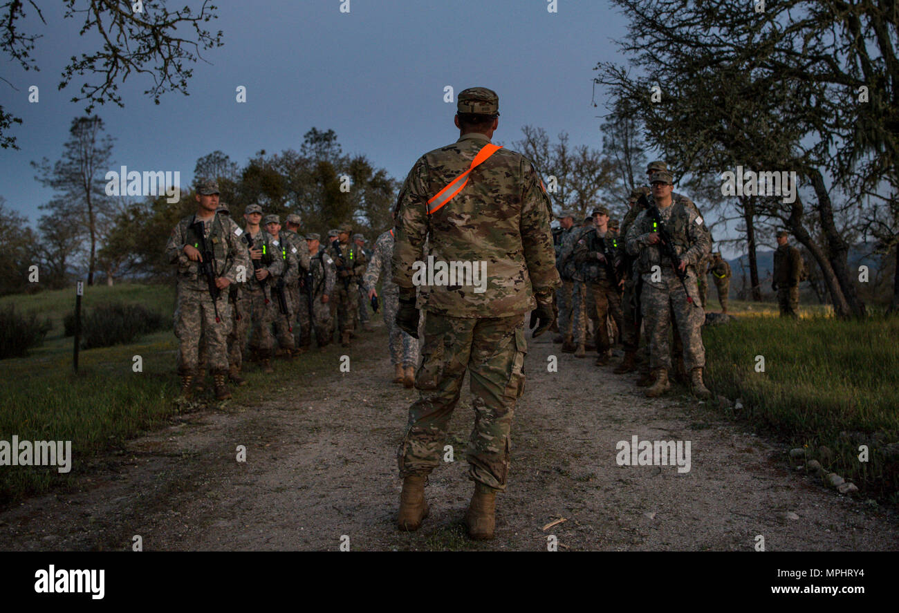 Soldiers from across the command complete their night land navigation  course and prepare to march out at this year's 200th Military Police  Command's Best Warrior Competition held at Fort Hunter Liggett, Calif,