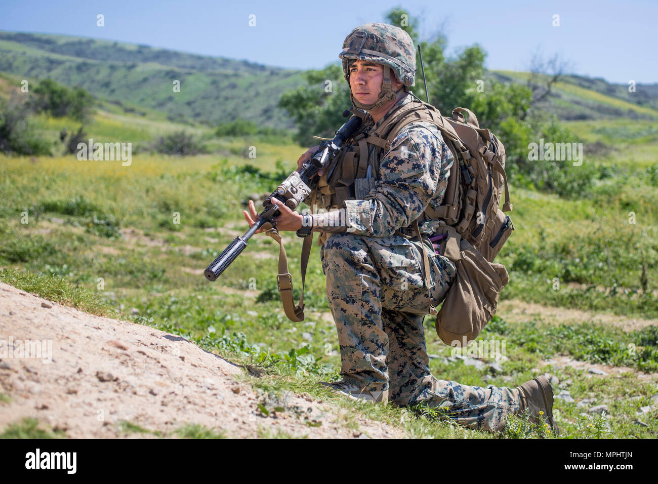 U.S. Marine Corps Cpl. Edgardo Gonzalez, rifleman, 3rd Battalion, 5th Marine Regiment provides security during a raid rehearsal at Camp Pendleton, Calif., March 16, 2017. Marines with 3rd Battalion, 5th Marine Regiment are training to maintain unit proficiency and preparing to deploy with the 15th Marine Expeditionary Force. (U.S. Marine Corps photo by Lance Cpl. Rhita Daniel) Stock Photo