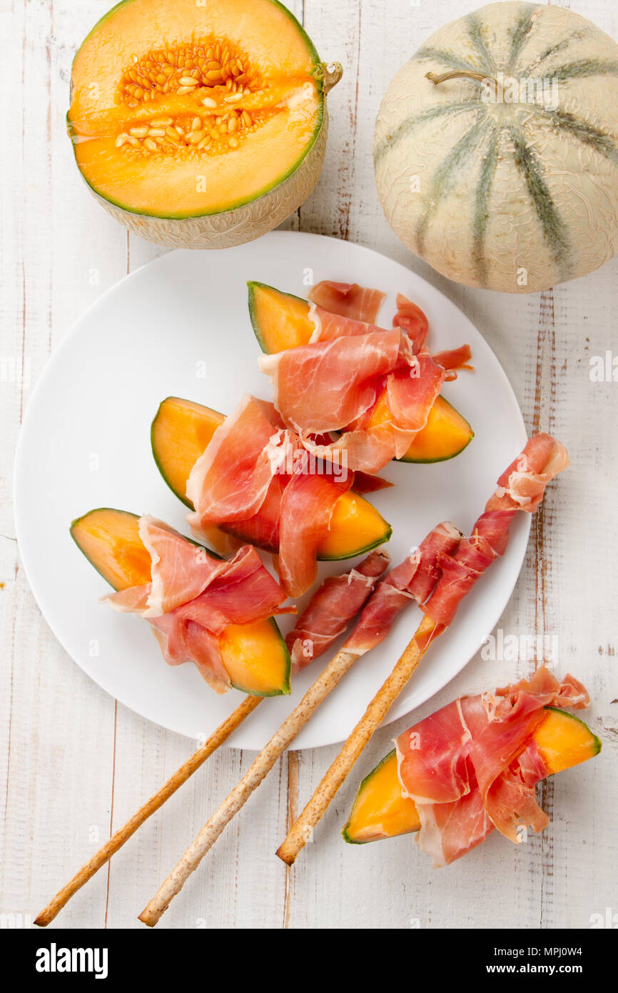 Cantaloupe melon with ham, a traditional Spanish and Italian appetizer