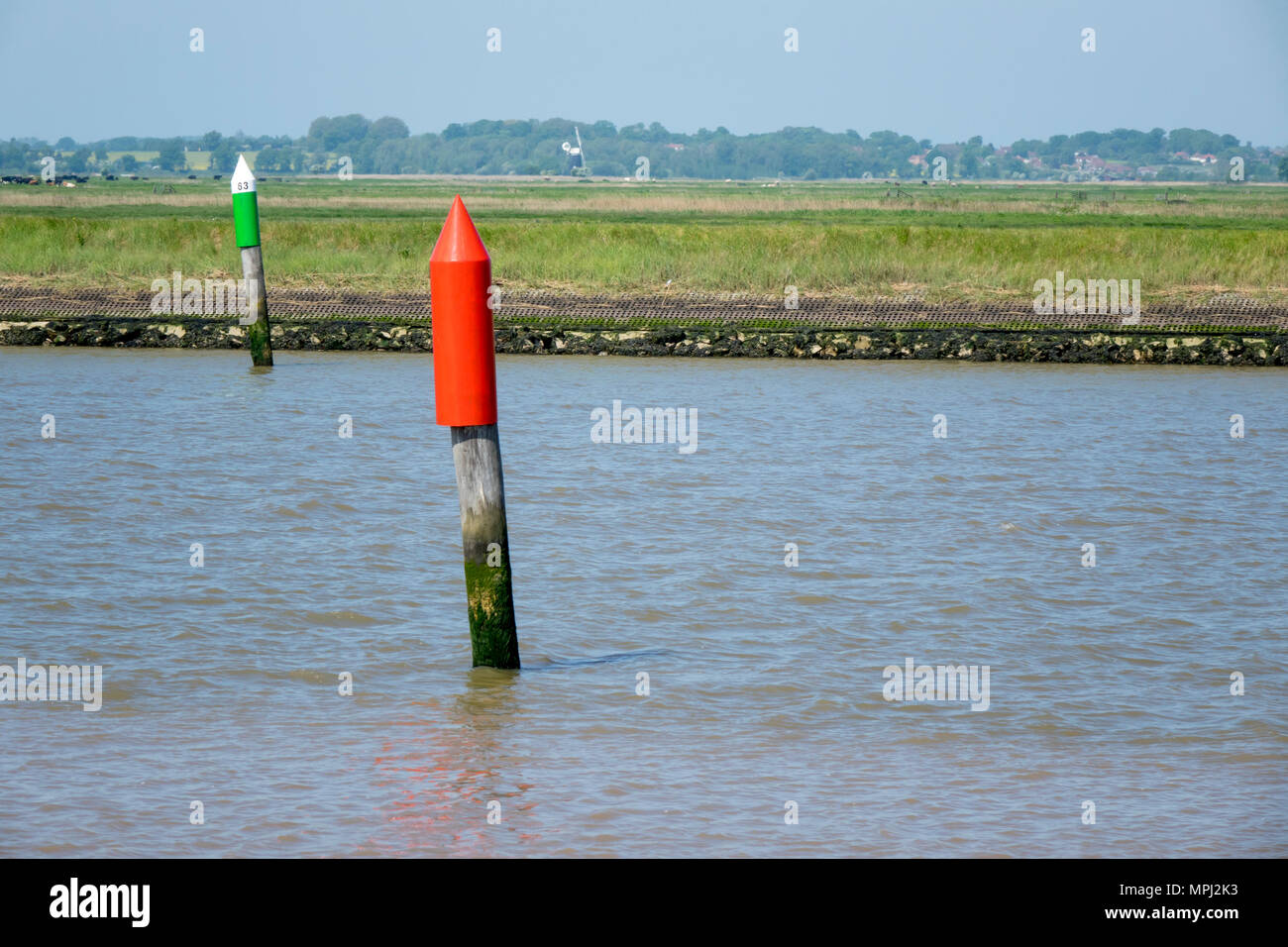 Breydon water marker posts Stock Photo Alamy