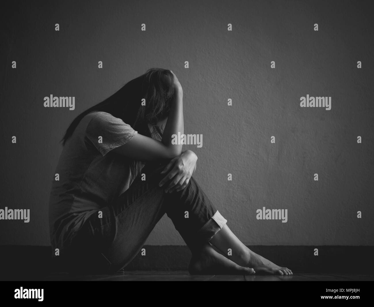 Depression. Close Up Portrait Of A Sad Woman Looking Down, Profile View,  Isolated On White Background, Black And White Stock Photo, Picture and  Royalty Free Image. Image 58154341.